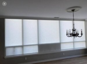 Custom Pickering luxury window shades in a modern living room by Crazy Joe’s